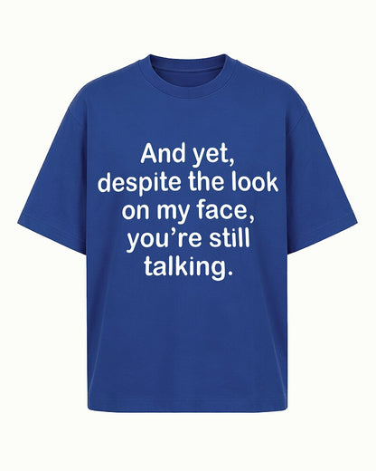 Despite the Look on My Face, You're Still Talking quote on Gray cotton T-shirt
