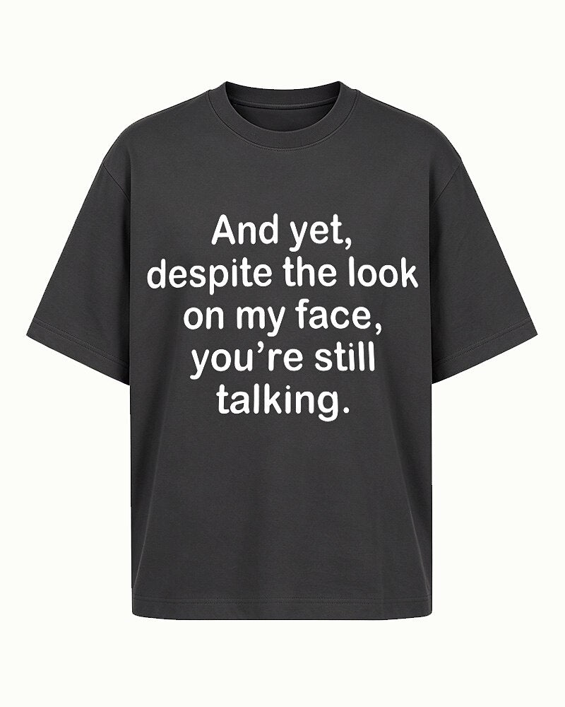 Despite the Look on My Face, You're Still Talking quote on Black cotton T-shirt