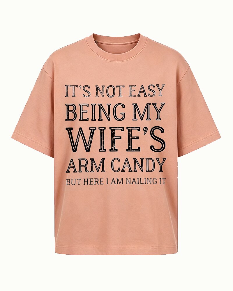 It's Not Easy Being My Wife's Arm Candy, but Here I Am Nailing It quote on Gray cotton T-shirt