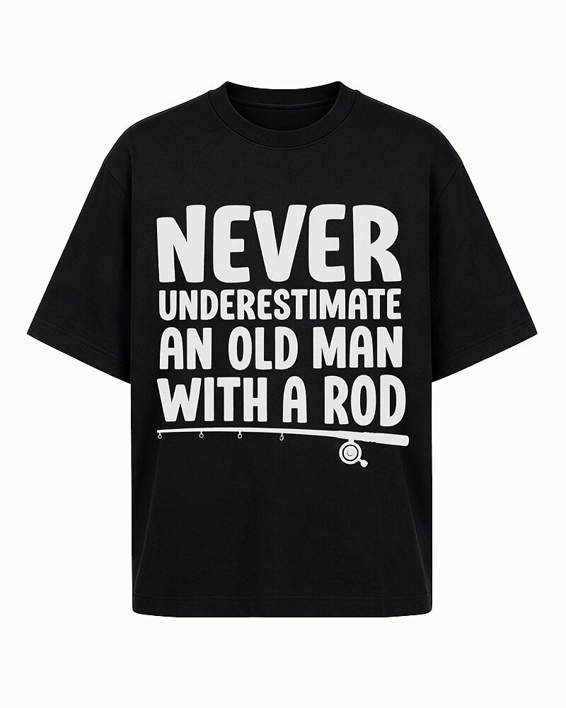 Never Underestimate an Old Man With a Fishing Rod quote on Black cotton T-shirt