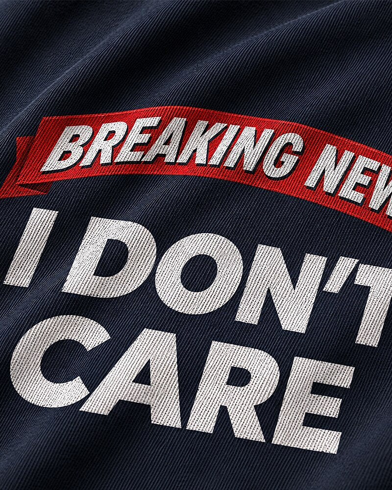 Breaking News: I Don't Care quote on Wine Red cotton T-shirt