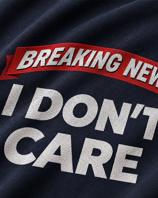Breaking News: I Don't Care quote on Wine Red cotton T-shirt