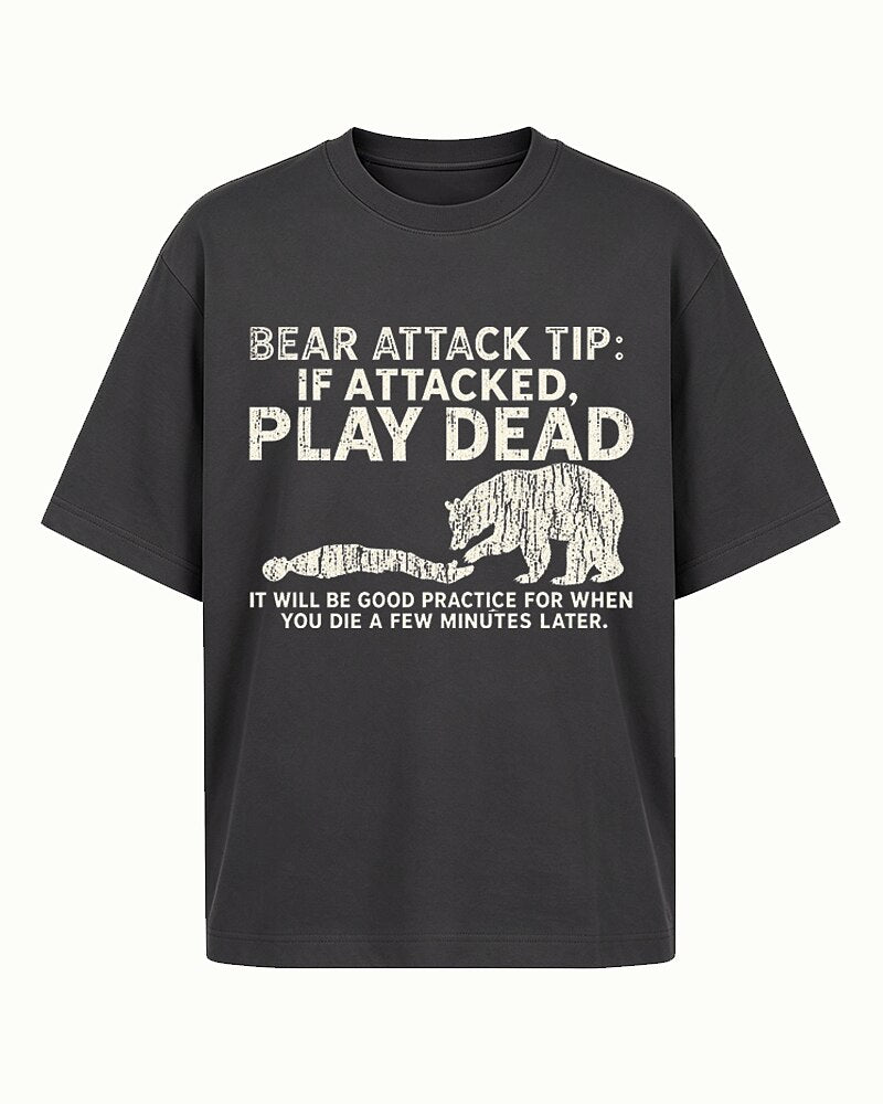 Bear Attack Tip: Play Dead dark-humor graphic on Dark Green cotton T-shirt