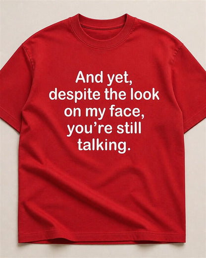 Despite the Look on My Face, You're Still Talking quote on Black cotton T-shirt